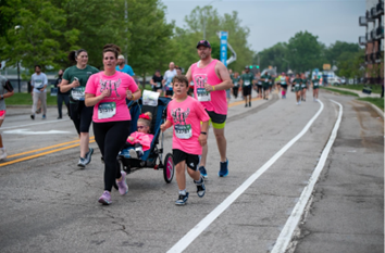 The Lamsons running with Ella